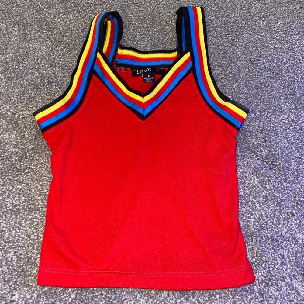 Red tank top with rainbow straps.
